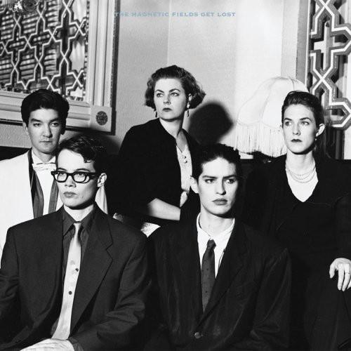 Black and white album cover featuring five band members in formal attire