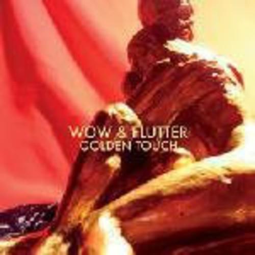 Vinyl LP cover featuring a textured brown sculpture against a red and yellow background