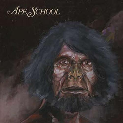 Vinyl LP cover featuring a painted portrait of a primate-like face with dark hair