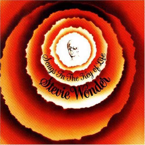 Orange and red album cover with concentric circles and a central portrait