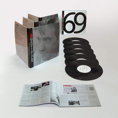 Black vinyl records displayed with a gatefold sleeve and printed booklet