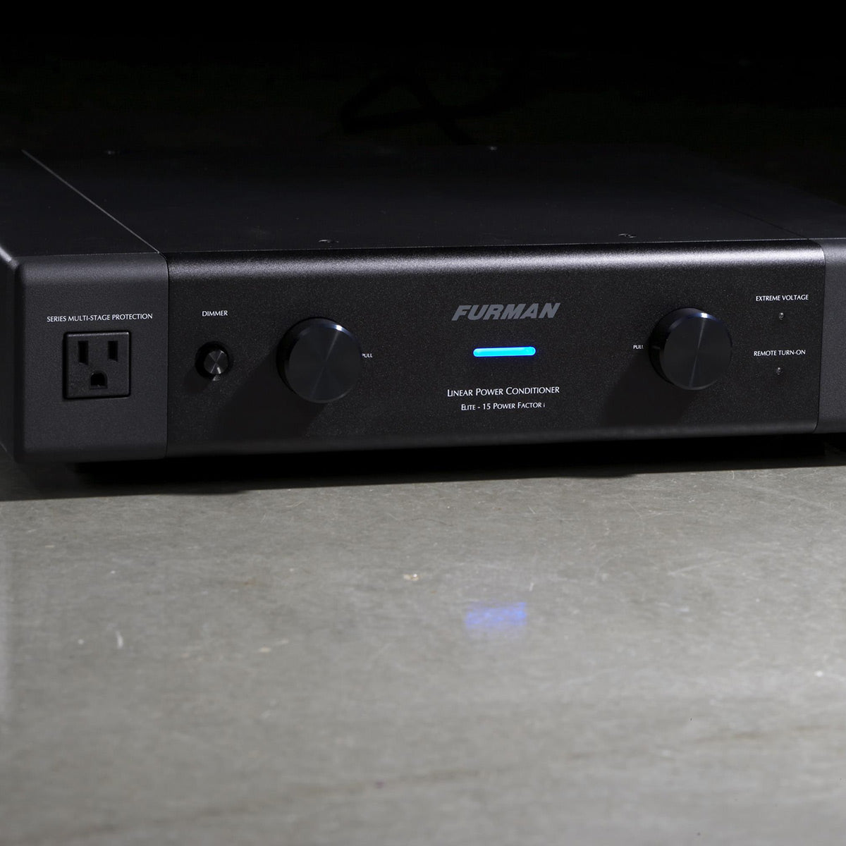 Black power conditioner with digital display and multiple outlets, front view