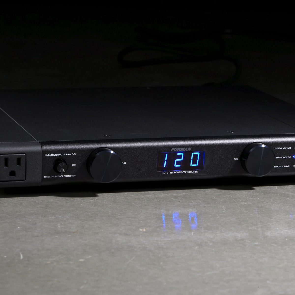 Black power conditioner with digital display and multiple outlets, front view