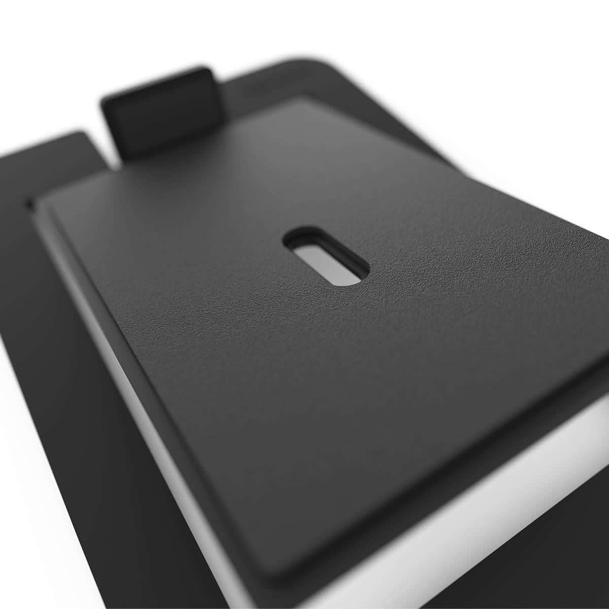 Black bookshelf speakers on matching stands with angled design