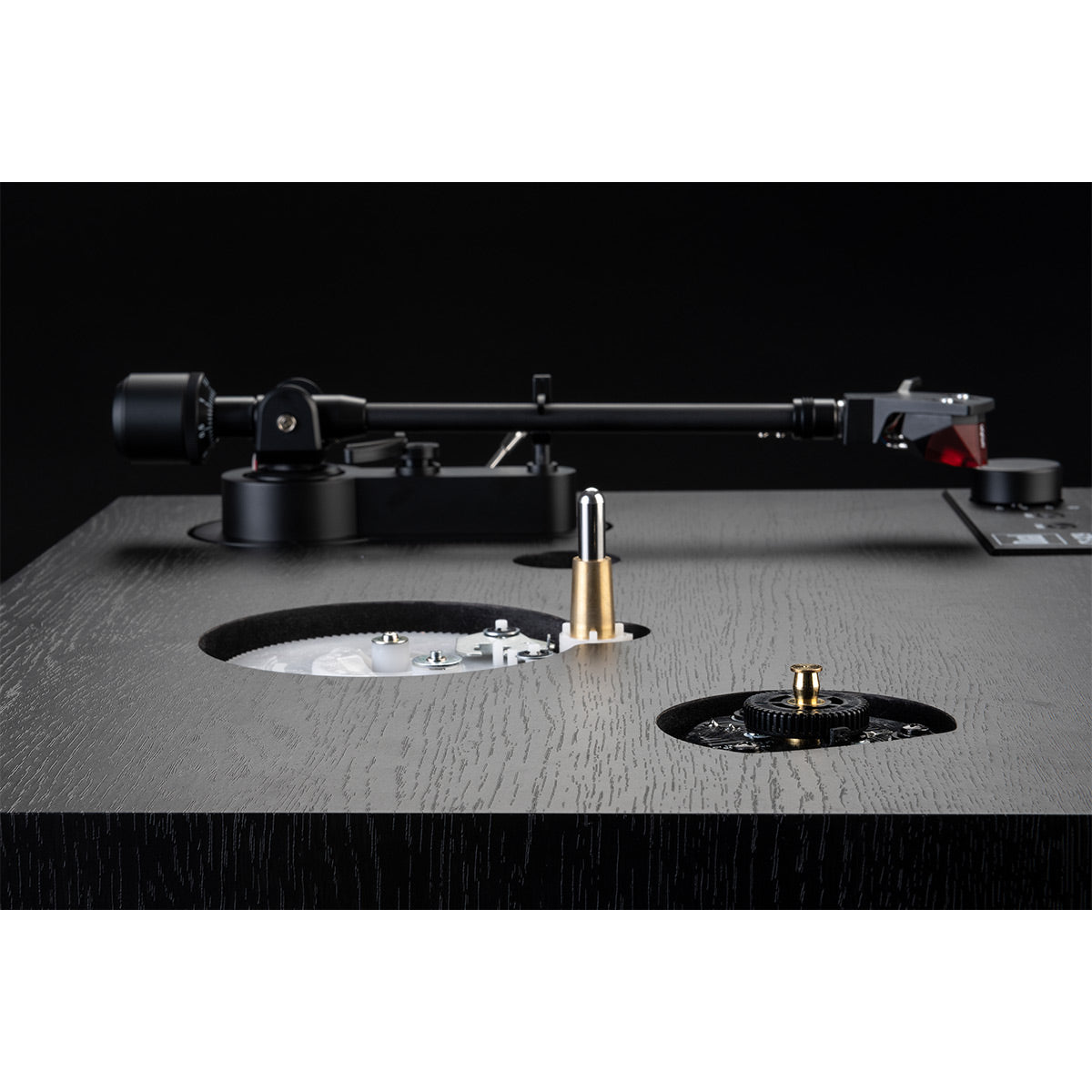 Black veneer turntable with fully automatic 3-speed operation and sleek design