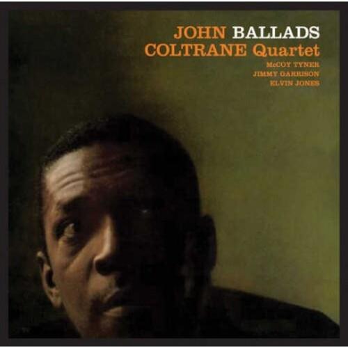 Vinyl LP cover featuring a close-up portrait of a man with orange and white text