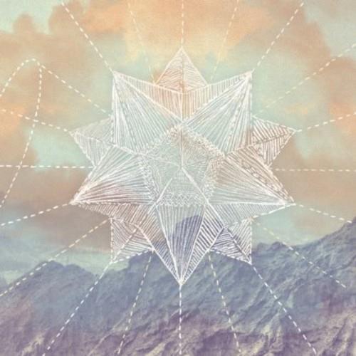 Geometric star illustration over a mountain landscape with a pastel sky