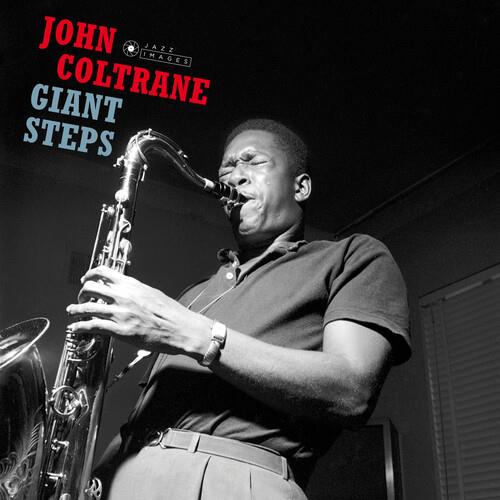 Black and white photograph of a man playing a tenor saxophone