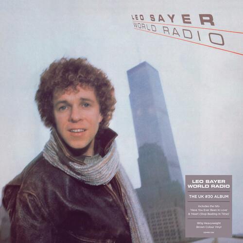 Brown vinyl LP cover featuring a man in a leather jacket and scarf with a skyscraper in the backgrou