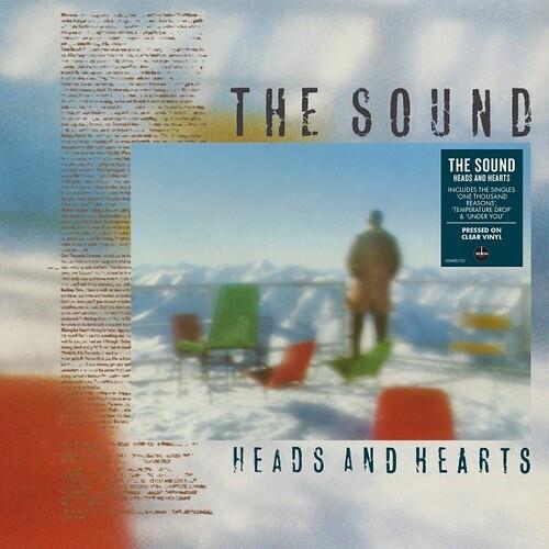 Clear vinyl LP with a snowy landscape cover featuring a figure and colorful chairs