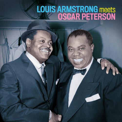 Two smiling men in suits and hats with arms around each other