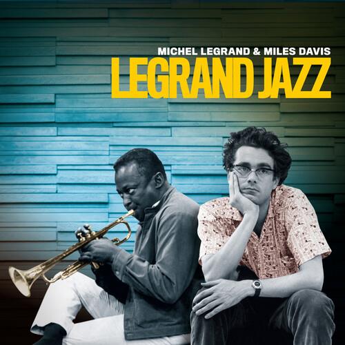 Vinyl LP cover featuring a black and white photo of two men against a blue wooden wall