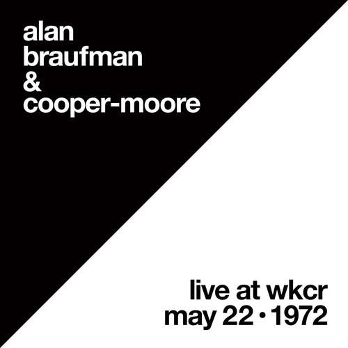 Black and white album cover with diagonal split and bold typography