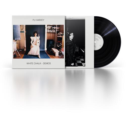 White vinyl LP record partially removed from a white sleeve featuring a photo of a woman in a white