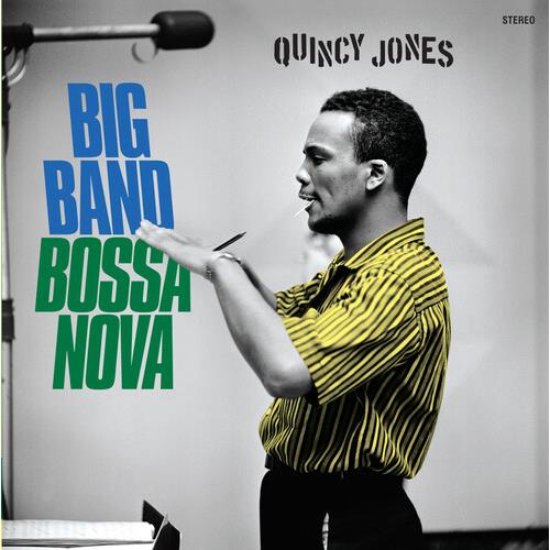 Black and white album cover featuring a man in a striped shirt conducting