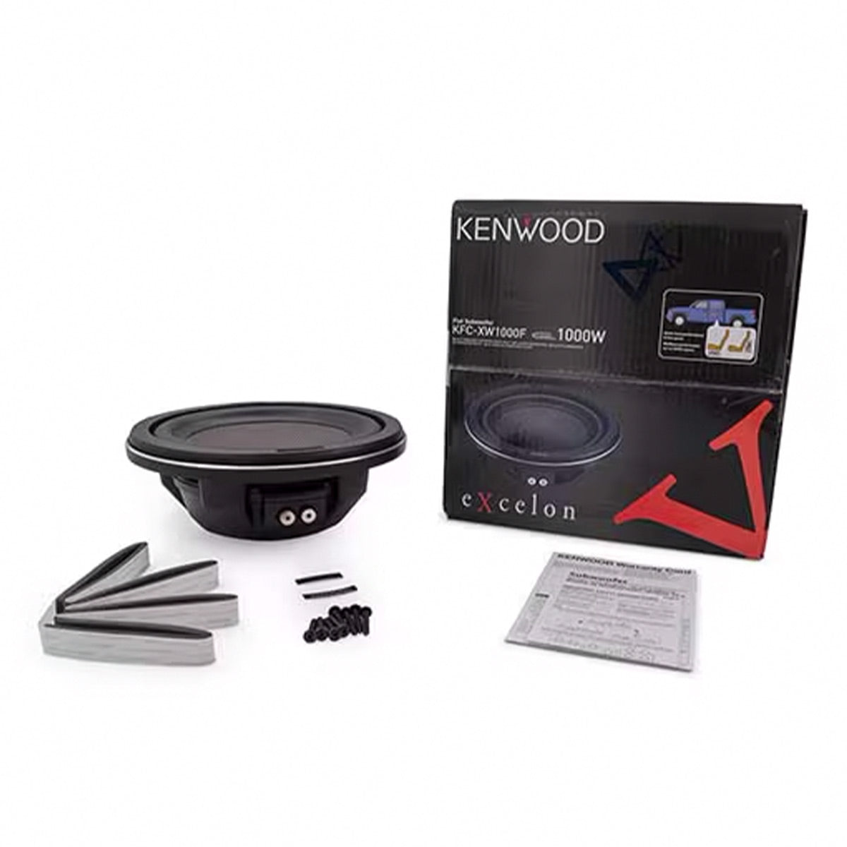 Black slim car subwoofer with silver trim and dual terminals alongside mounting hardware and retail