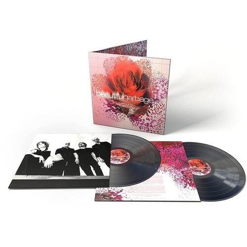 Gatefold vinyl LP set with two black records and printed inner sleeves featuring band photography
