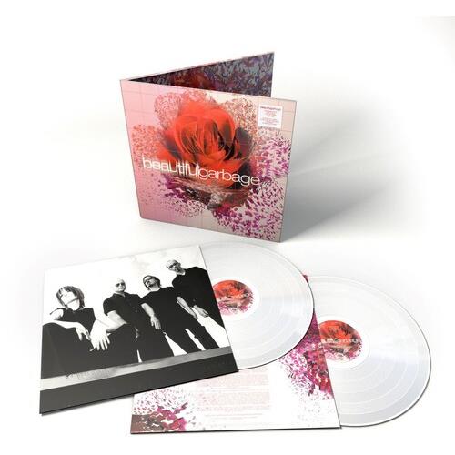 Clear vinyl LP with pink and red floral gatefold sleeve and black-and-white band photo insert