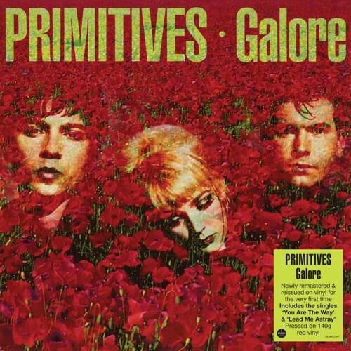 Red vinyl LP cover featuring three faces emerging from a field of red flowers