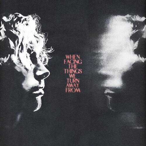 Black and white vinyl album cover featuring two mirrored profile silhouettes with red text