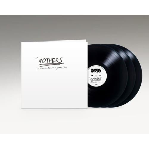 White gatefold album sleeve with handwritten text and two black vinyl records