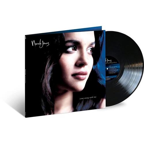 Vinyl LP with a gatefold sleeve featuring a close-up portrait of a woman