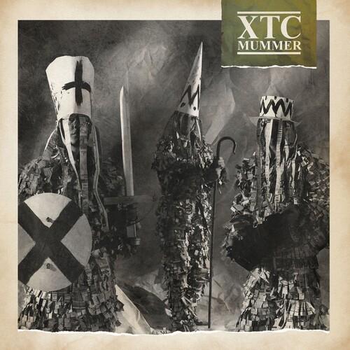 Black and white album cover featuring three figures in tattered costumes and tall hats