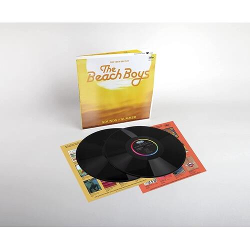 Yellow gatefold vinyl sleeve with two black records and printed inner sleeves