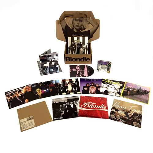 Deluxe box set containing multiple vinyl records, a 7-inch single, and a booklet with band photos