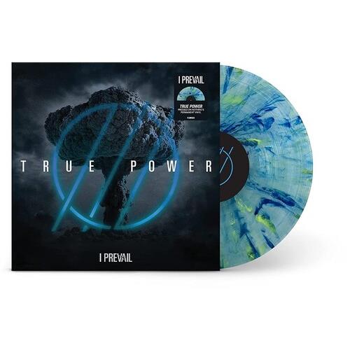 Blue and green marbled vinyl record next to a black album cover featuring a floating rock and neon b