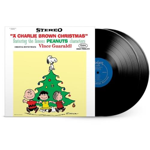 Vinyl record sleeve featuring Peanuts characters around a decorated Christmas tree