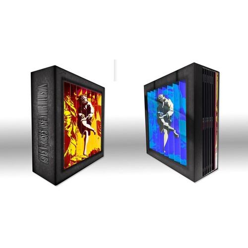 Black box set with two illustrated panels featuring a guitarist in red and blue tones