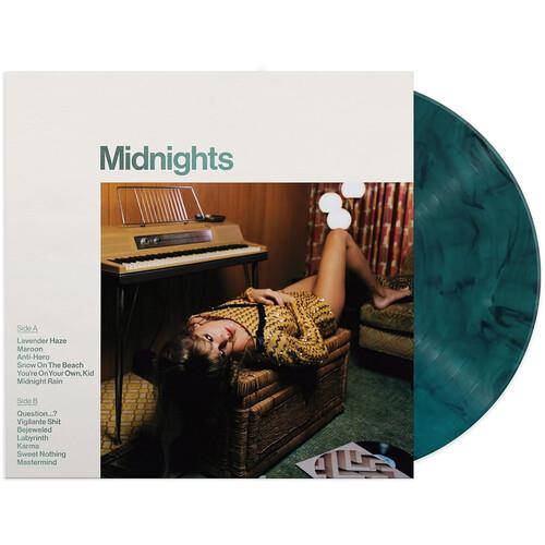 Jade green marbled vinyl record partially removed from white album sleeve