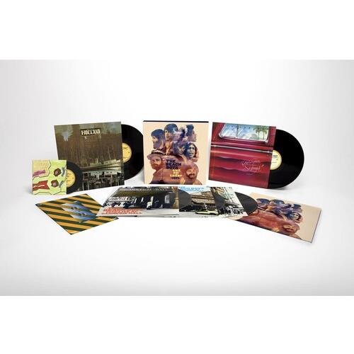 Deluxe vinyl box set with multiple LPs and EPs featuring colorful album artwork and inserts