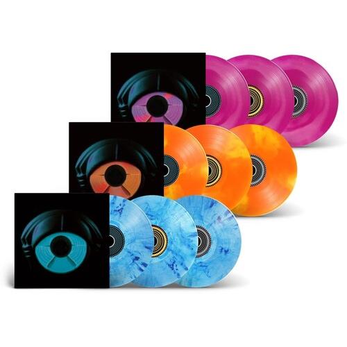 Three sets of triple LPs in pink, orange, and blue marbled vinyl with black sleeves