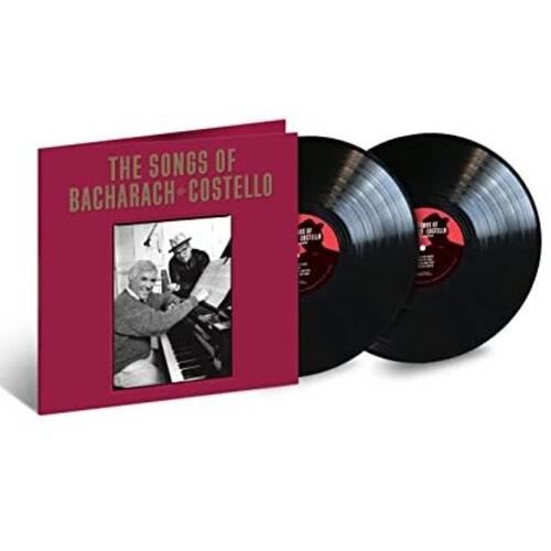 Maroon gatefold vinyl LP sleeve with black and white photo of two men at a piano