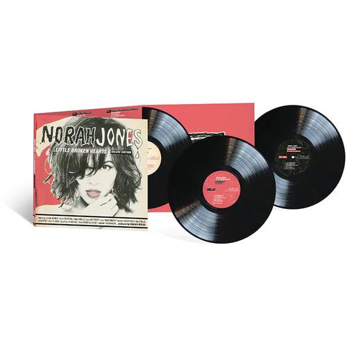Deluxe edition vinyl box set with three black records and illustrated gatefold cover