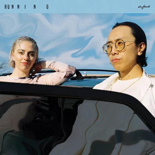 Vinyl record cover featuring two people leaning out of a convertible against a blue sky