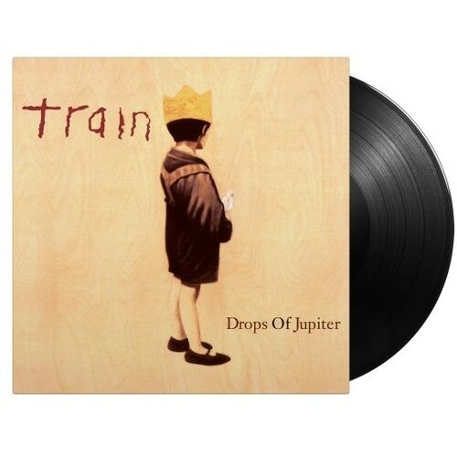 Vinyl LP with a wood-grain cover featuring a child in a crown and black vinyl record