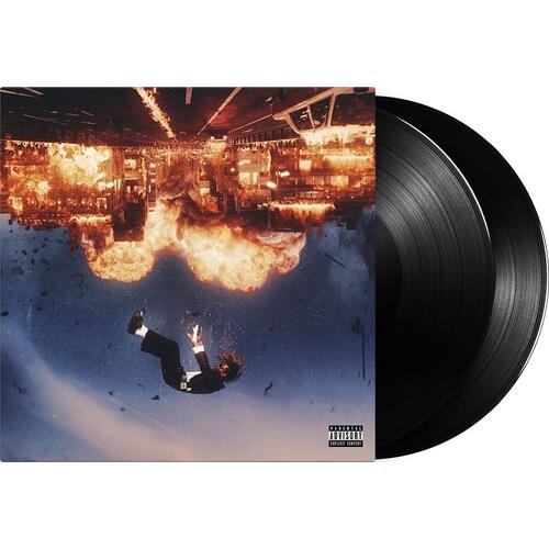 Double LP vinyl record with cover art showing a figure falling from an exploding building