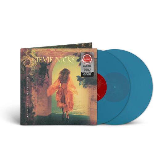 Transparent sea blue vinyl LP with gatefold sleeve featuring a woman in a flowing dress