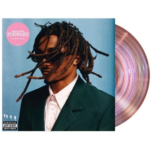 Translucent pink vinyl record with album cover featuring a man in a green suit and sunglasses