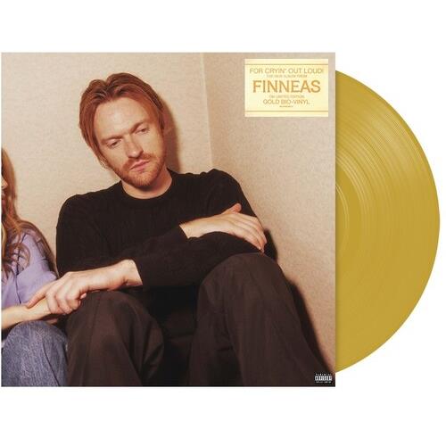 Gold biovinyl LP record partially removed from its album sleeve featuring a portrait of a man in a b