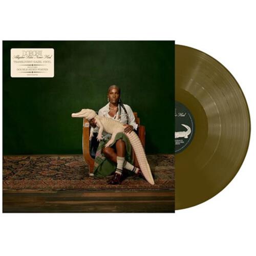 Translucent hazel vinyl record with album cover art featuring a person holding a white alligator