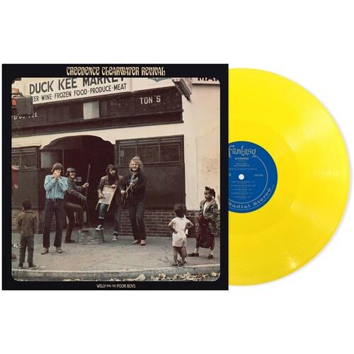 Canary yellow vinyl record displayed next to its black and white album cover
