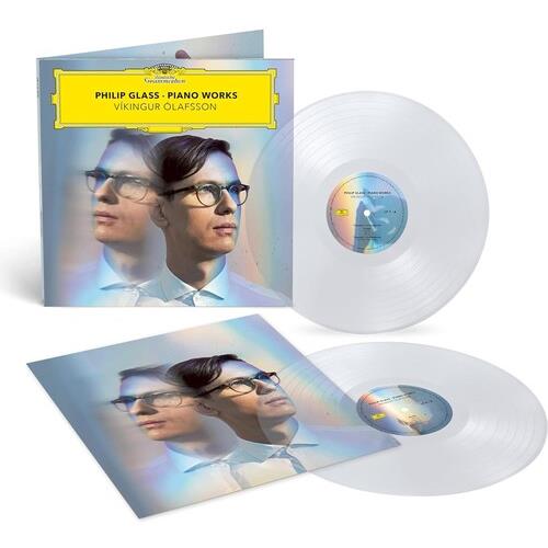 Clear vinyl LP set with gatefold sleeve featuring a portrait of a man with glasses