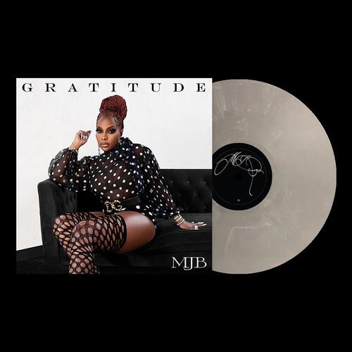 Silver vinyl record with black center label and album cover art