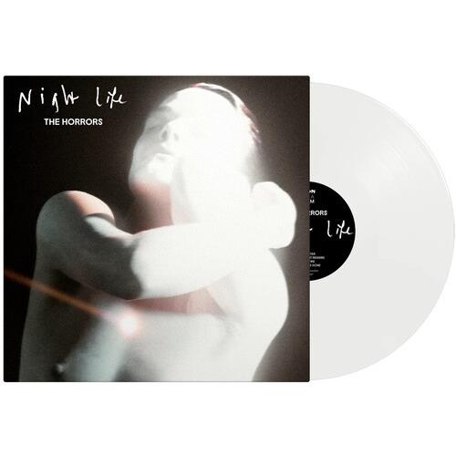 Clear vinyl LP with black and white album cover featuring a blurred figure