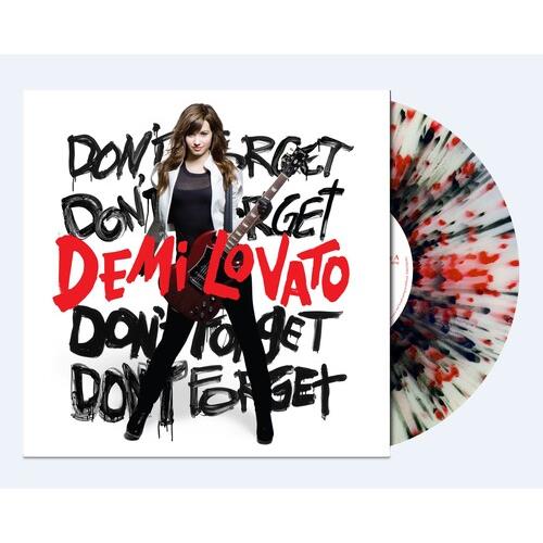Clear vinyl LP with red and black splatter pattern next to white album cover