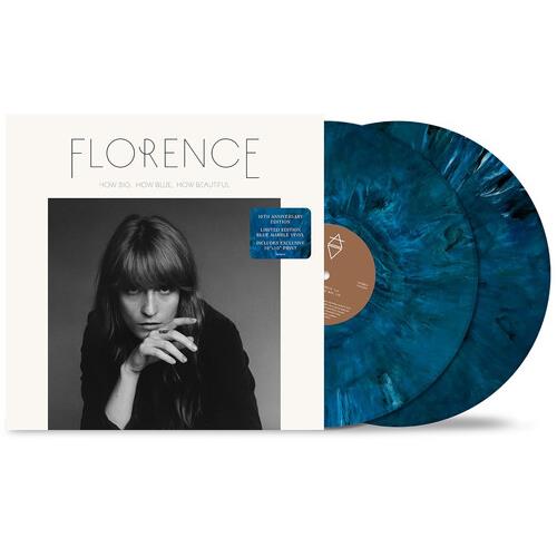 Blue marble vinyl LPs displayed next to a white album sleeve featuring a black and white portrait